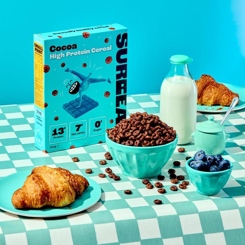 Surreal Surreal Cocoa - High Protein Cereal 6 Pack - Zero Sugar- Healthy Plant Based Cereal - High in Fibre - Low Carb - Gluten Free - Vegan - 13g of Protein, 0g of Sugar - 240g per Box