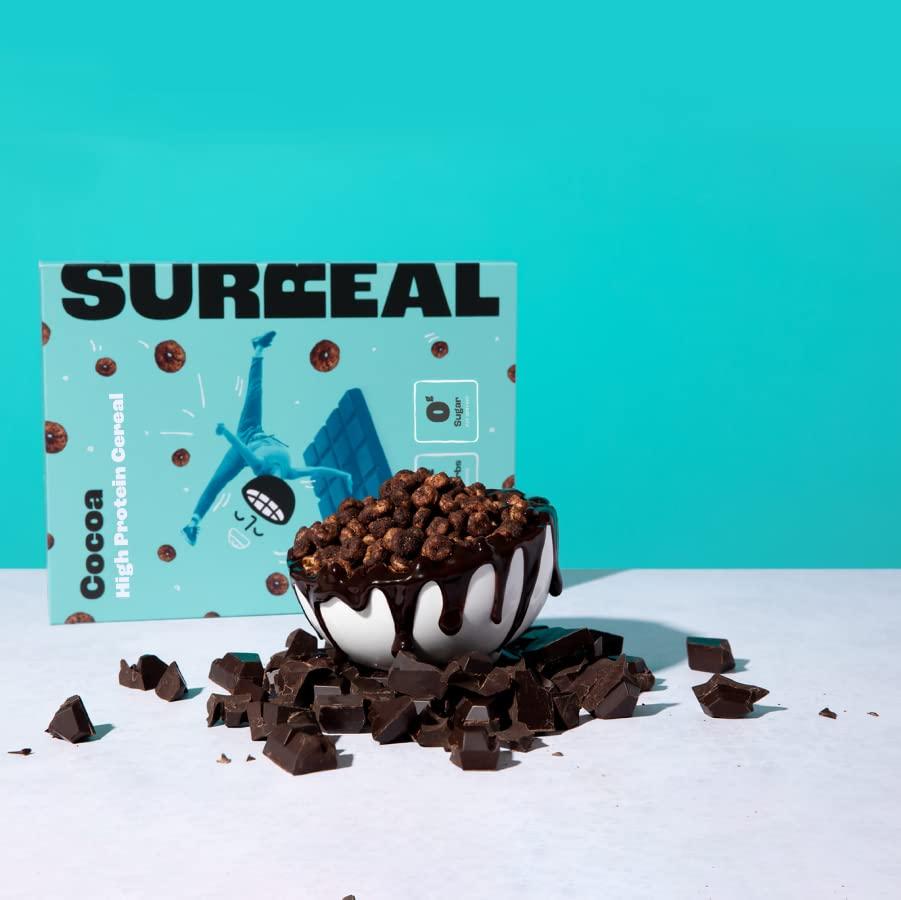 Surreal Surreal Cocoa - High Protein Cereal 6 Pack - Zero Sugar- Healthy Plant Based Cereal - High in Fibre - Low Carb - Gluten Free - Vegan - 13g of Protein, 0g of Sugar - 240g per Box